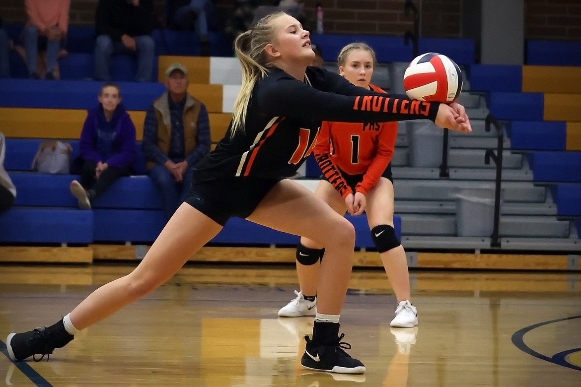 Aubrey Butcher makes a lunging pass for Plains in the opening round of the 7B District Volleyball Tournament in Thompson Falls Friday. (Jeremy Weber/Daily Inter Lake)