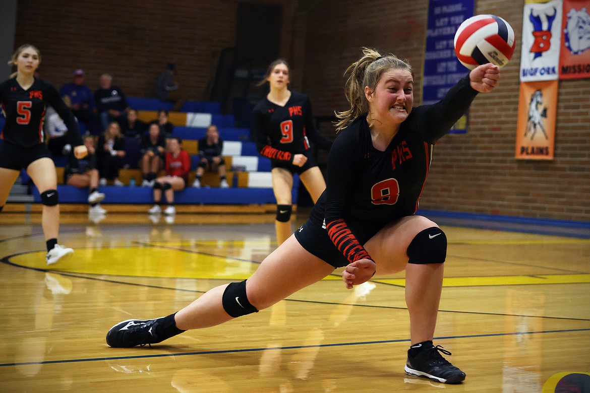 Lexie Deming making a lunging play on the ball for Plains in the opening round of the 7B District Volleyball Tournament in Thompson Falls Friday. (Jeremy Weber/Daily Inter Lake)