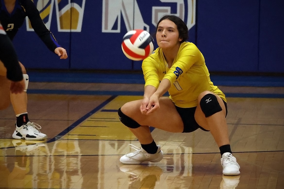 The Blue Hawks' Cheyla Irvine receives a serve during action in the second round of the 7B District Volleyball Tournament in Thompson Falls Friday. (Jeremy Weber/Daily Inter Lake)