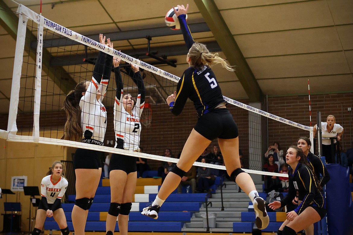 The Blue Hawks' Natalie Roberts goes up for a kill against Eureka in the second round of the 7B District Volleyball Tournament in Thompson Falls Friday. (Jeremy Weber/Daily Inter Lake)
