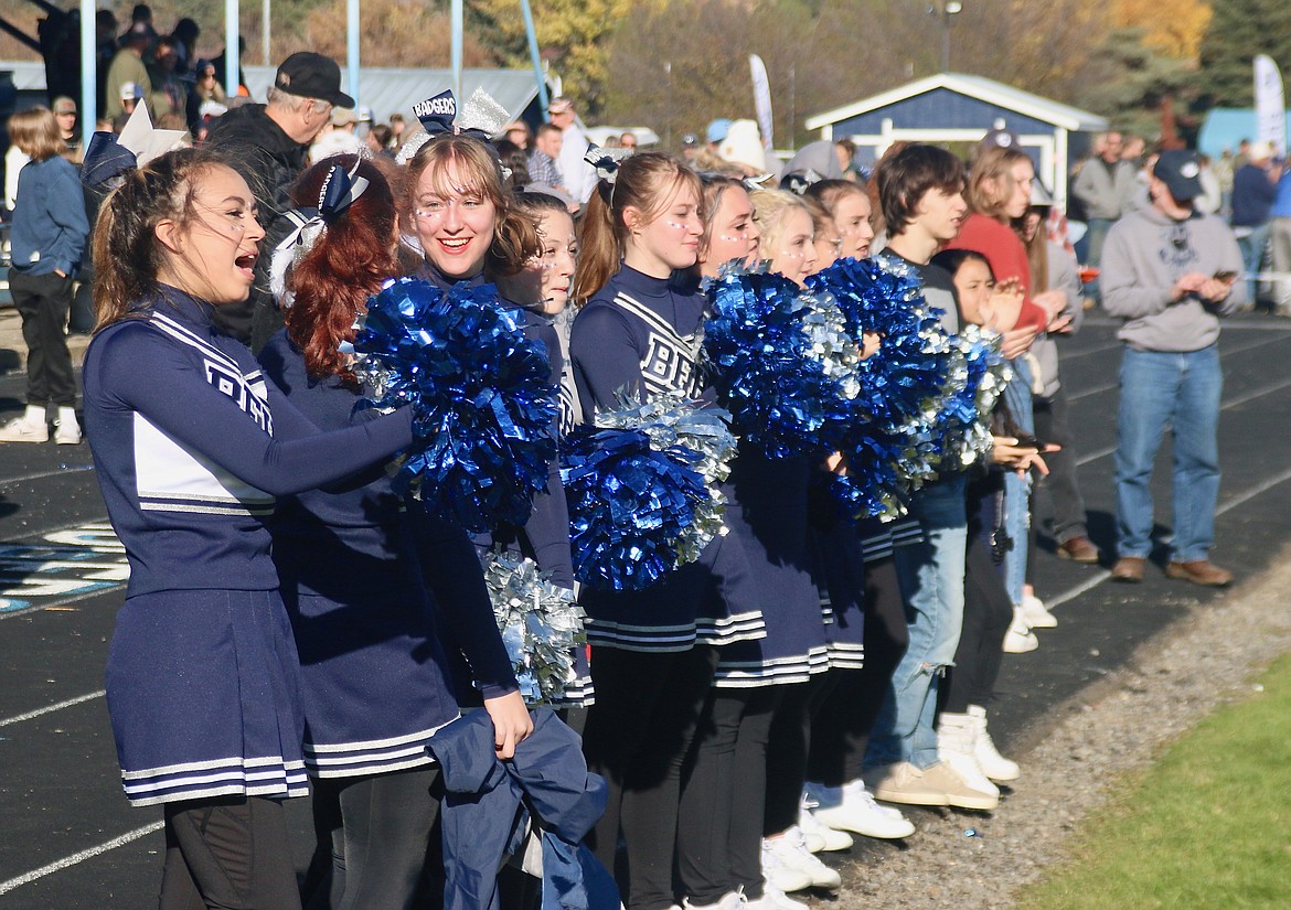 Badger cheer celebrates after playoff win.