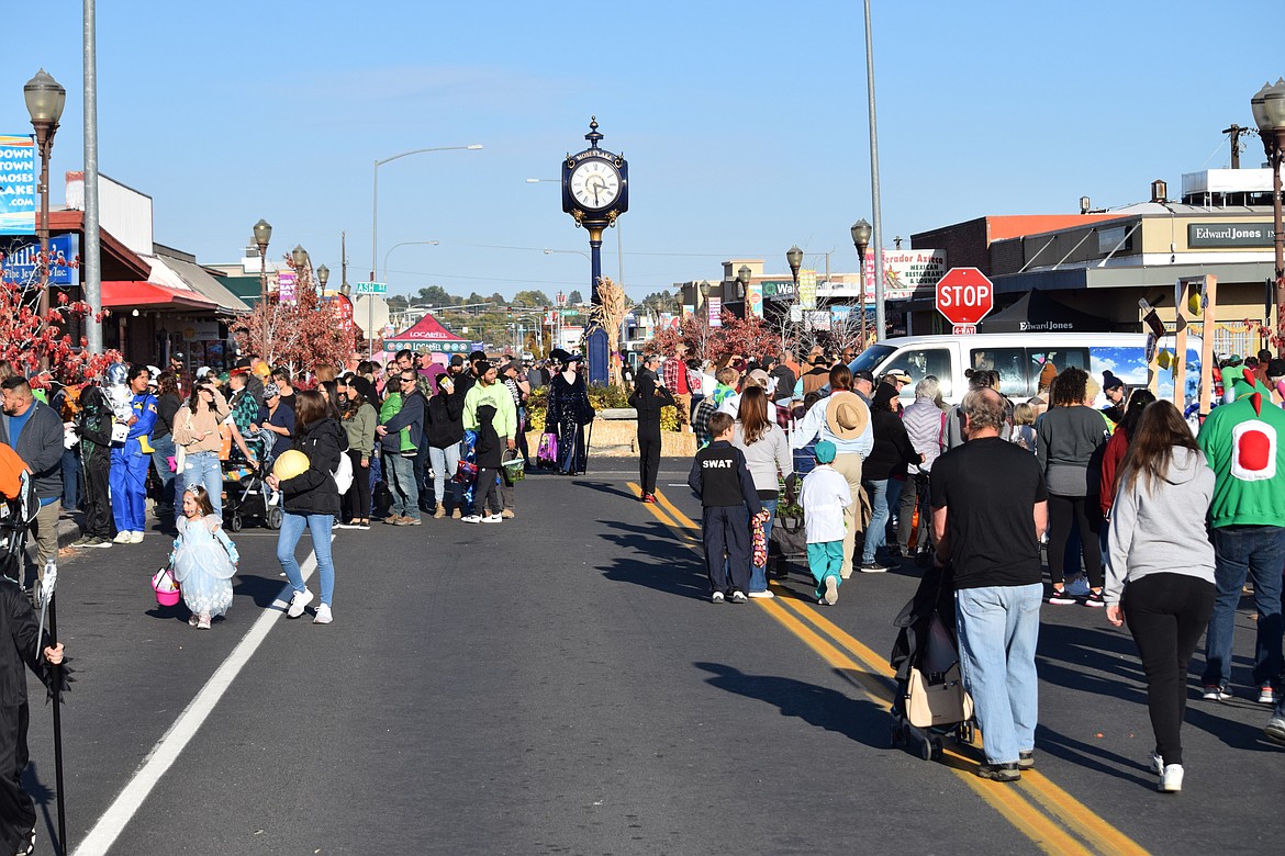 People gathered in downtown Moses Lake for the Harvest Festival on Saturday.