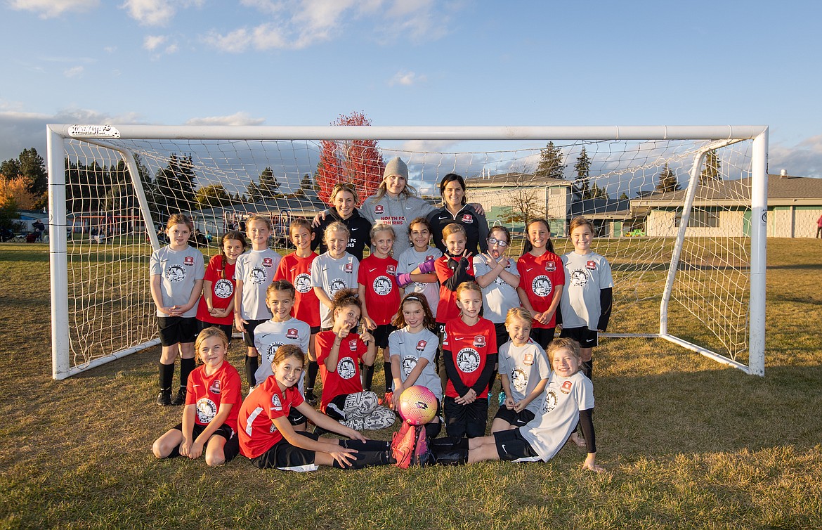 Photo by BUSCEMA PHOTOGRAPHY
The Thorns North FC 14 Girls Yellow and Green soccer teams played three games to close out the fall season. The Yellow and Green teams played two games against each other on Thursday and Saturday morning, then the Green team played against Spokane Sounders North on Saturday. Thorns goals were scored by Finley Martin, Poppy Moreau, Hatty Lemmon, Brielle Buscema, Harper Anderson and Allison Legg. In the front from left are Brielle Buscema and Harper Anderson; second row from left, Ellie Carper, Finley Martin, Liv Mickelson, Lydia Frank, Finley Rauscher and Avery Doran; third row from left, Elsie Hewitt-Nord, Stella Hartzell, Emma Thompson, Audrey Rietze, Rylee Smidt, Hatty Lemmon, Sophia Moreno, Quinn Baily, Lyla Maestas, Poppy Moreau and Allison Legg; and rear from left, coaches Jean Carper, Kara Lemmon and Katie Martin.