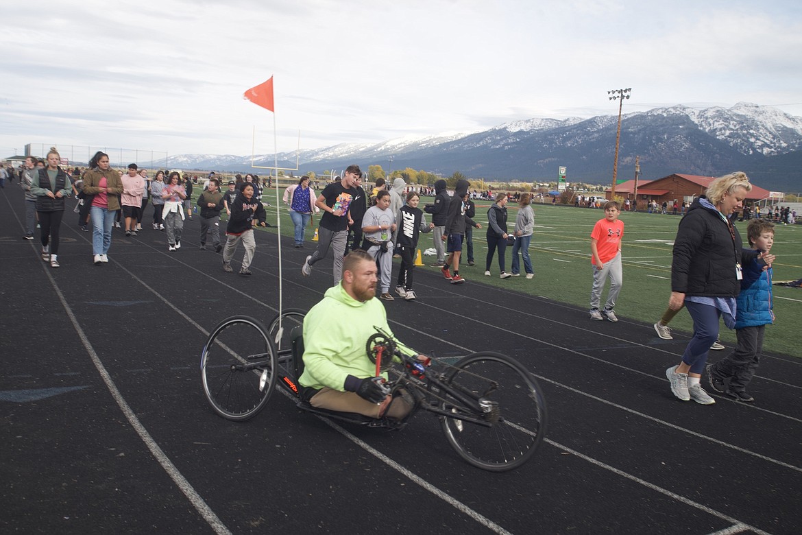 Tomy Parker was a speaker during last week's Red Ribbon Week in Ronan and also raced his hand-propelled trike around the track during the fun run.