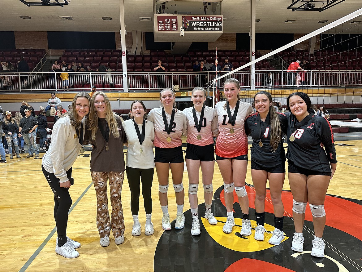 Courtesy photo
Players were honored from the Scenic Idaho Conference at the conclusion of the 1A District 1 Division I championship match at Christianson Gymnasium on Oct. 20. From left are Camryn Nichols (Genesis Prep), Bella Anderson (Genesis Prep), Katie Plummer (Genesis Prep), Savannah Smith (Wallace), Britney Phillips (Wallace), Tia Hendrick (Wallace), Arianna Havier-Gorr (Lakeside) and Tyla Lambert (Lakeside).