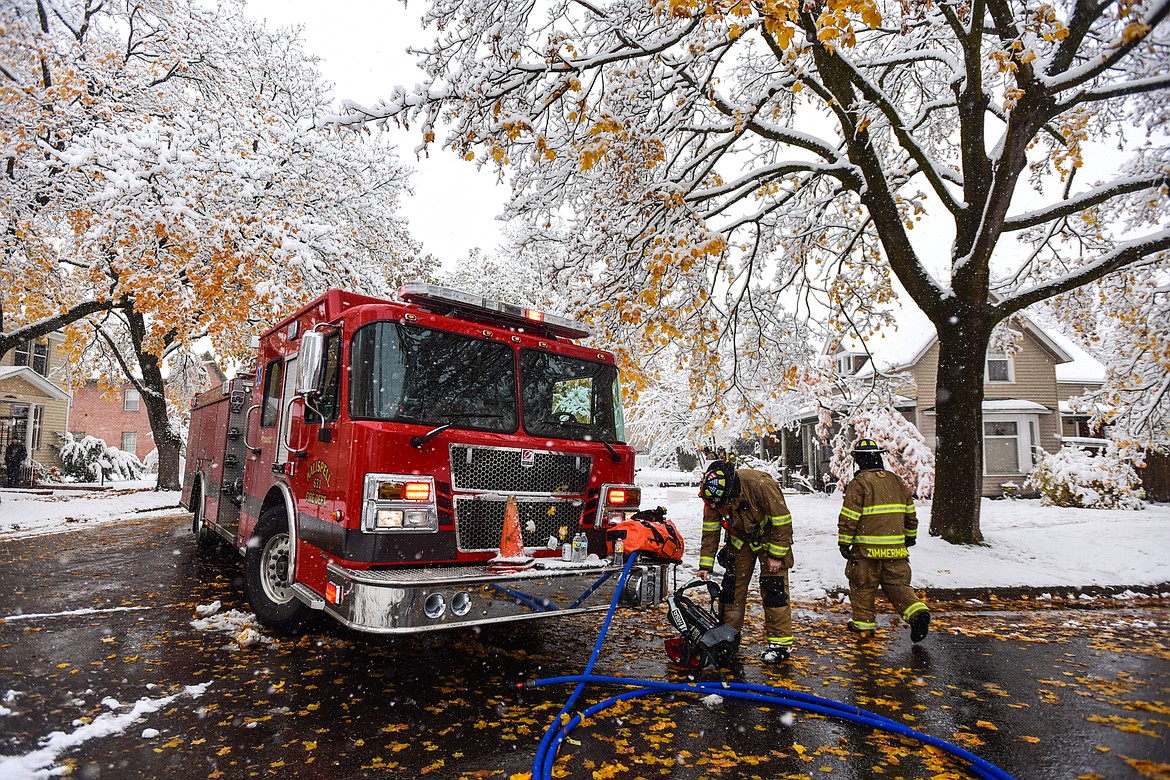 Kalispell Fire Department Engine 631 finishes up a call for a structure fire along Second Avenue East in Kalispell on Wednesday, Nov. 2. (Casey Kreider/Daily Inter Lake)
