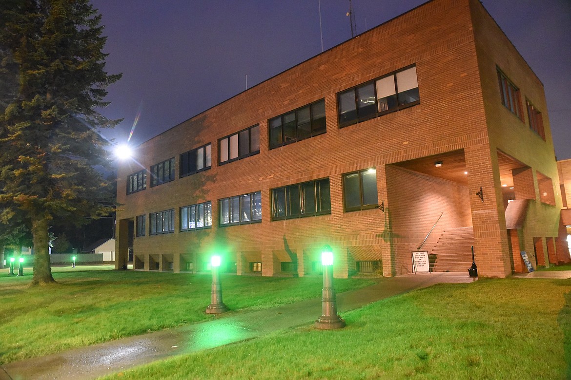 Green bulbs were placed in decorative light posts at the Lincoln County Courthouse for Operation Green Light which honors the sacrifices of veterans. (Scott Shindledecker/The Western News)