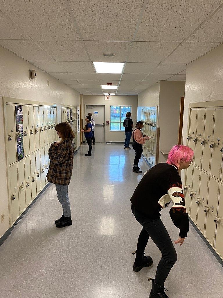 Columbia Falls High School speech and debate teammates warm up before practice in preparation for Saturday's Kalispell Kickoff tournament. Pictured front to back, Ruby Davis, Elli Sandstrom, Robyn Maddux, Eleanor Smiley, Charles Hakes and Carson Settles.