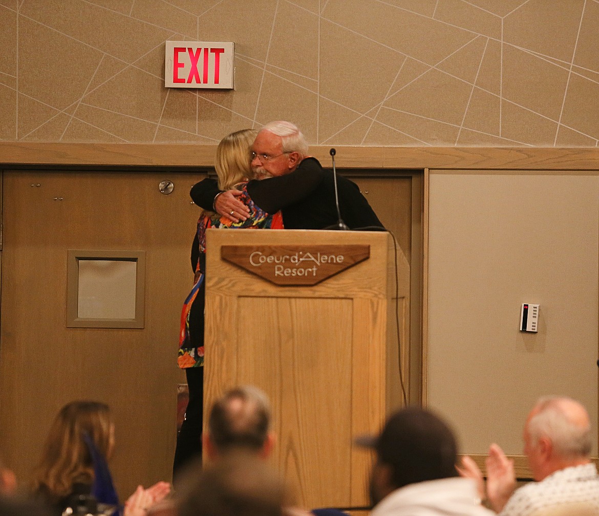 Hagadone Corporation President Brad Hagadone hugs Carol Kreighbaum to congratulate her on 45 years with the company during the After Five Luncheon in The Coeur d'Alene Resort on Wednesday. Kreighbaum started at the North Shore in the catering department. She continued in the catering department with the opening of The Resort. She moved to the Coeur d'Alene Inn in 1999 as the catering director, "and continues to do a fantastic job," said Brianna Shriner, Hagadone Corporation corporate administrative manager.