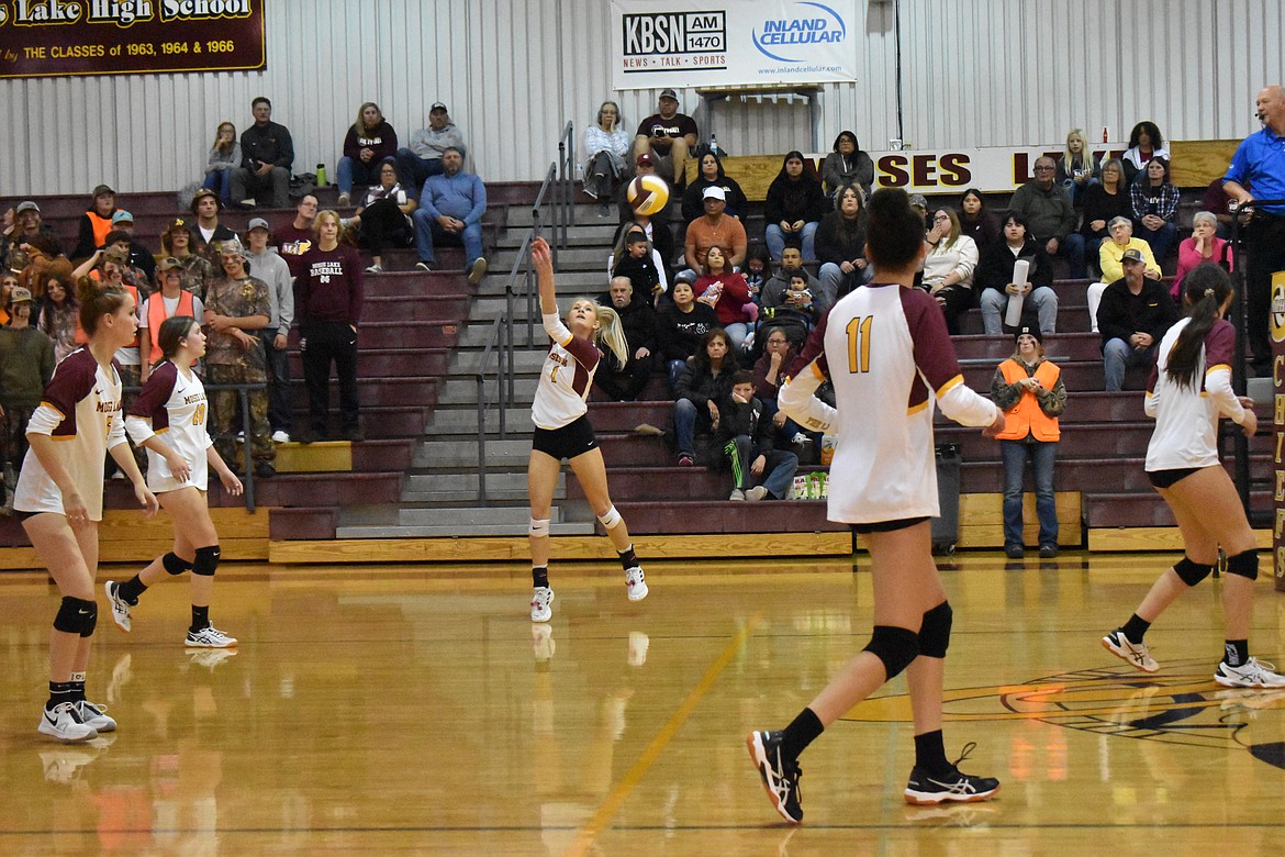 MLHS senior Kailee Kellum bumps the ball as her teammates prepare for Eastmont’s next move.