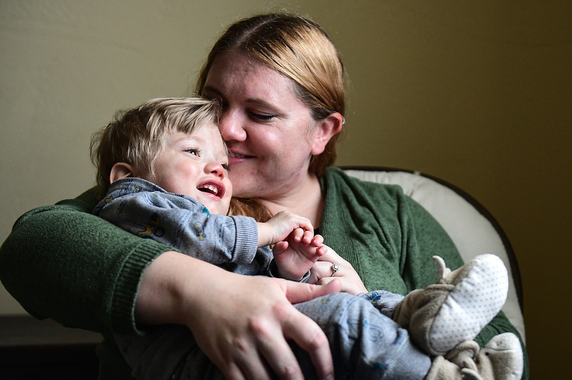 Breanna Villanueva holds her son Rocky at their home in Kalispell on Wednesday, Nov. 2. (Casey Kreider/Daily Inter Lake)