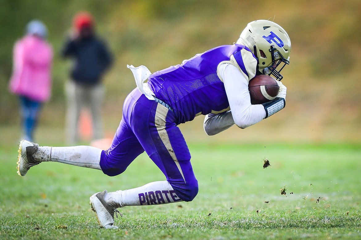 Polson wide receiver Trent Wilson (5) holds on to a reception in the fourth quarter against Laurel at Polson High School on Saturday, Nov. 5. (Casey Kreider/Daily Inter Lake)