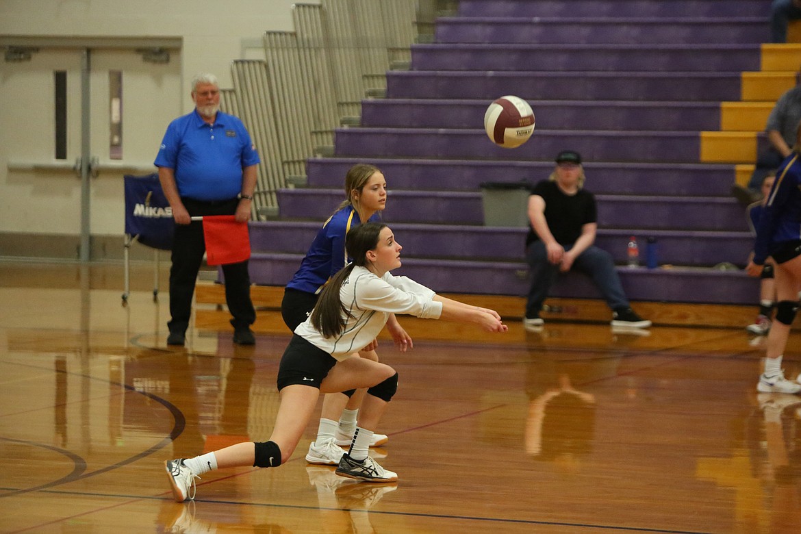 Wilson Creek junior Jessa Bise passes the ball after a Waterville-Mansfield serve.