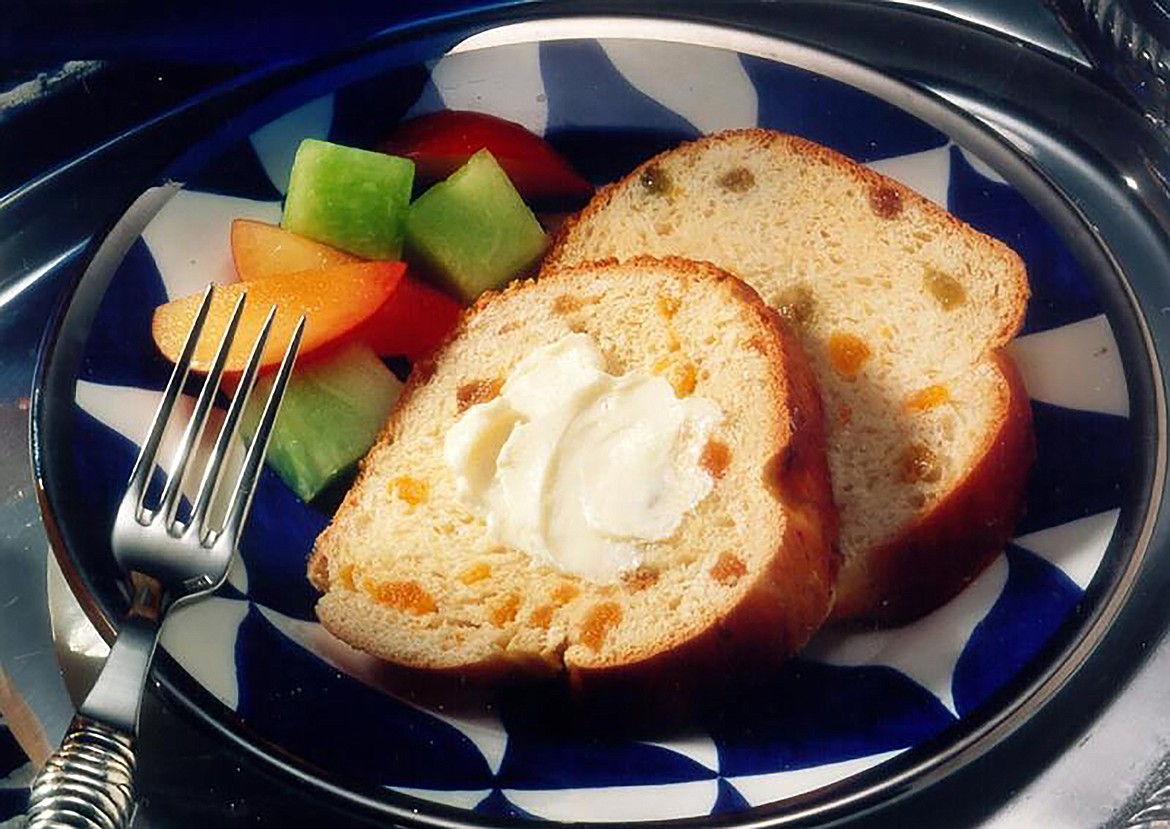 Over the holidays, fruited breads, such as this braided orange ring from the folks at Fleischmann's Yeast, are part of the seasonal delights ahead.