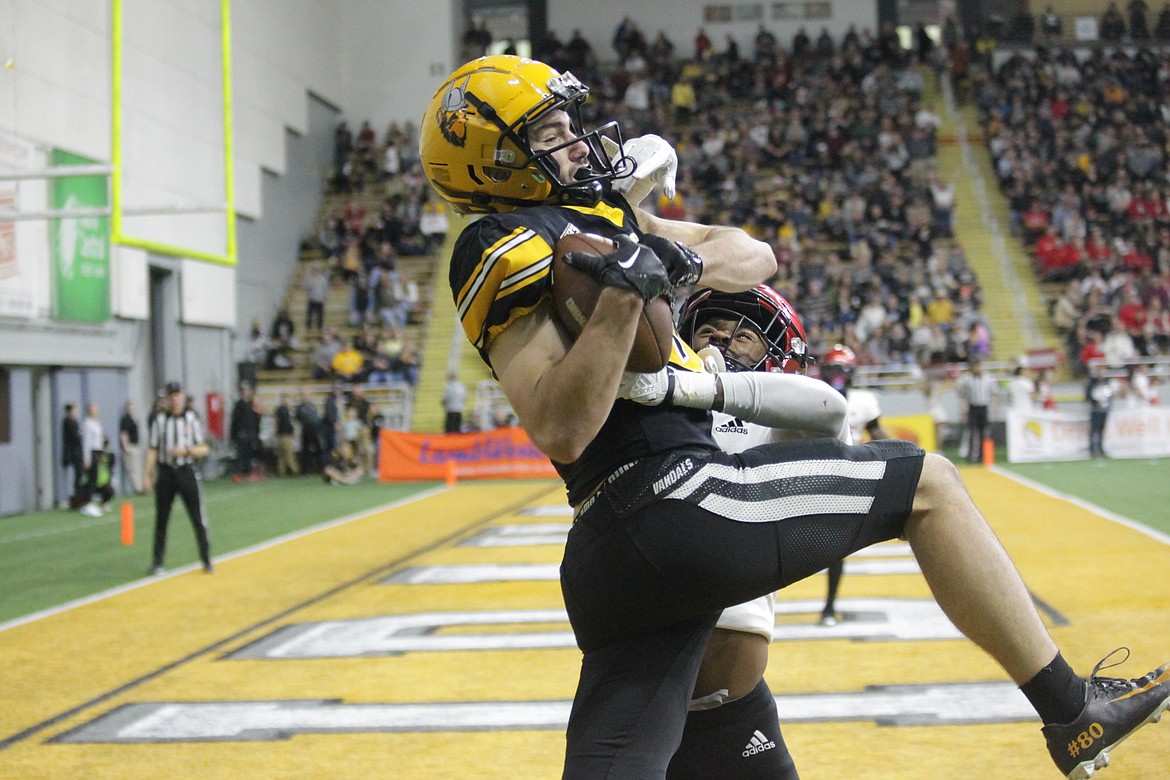 MARK NELKE/Press
Hayden Hatten of Idaho out-fights an Eastern Washington defender for his school record-tying fourth touchdown catch on Saturday at the Kibbie Dome in Moscow.