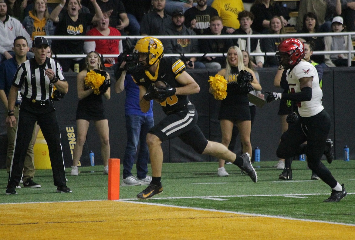 MARK NELKE/Press
Idaho's Hayden Hatten crosses the goal line in the first quarter with the first of his four touchdown catches on Saturday against Eastern Washington in Moscow.