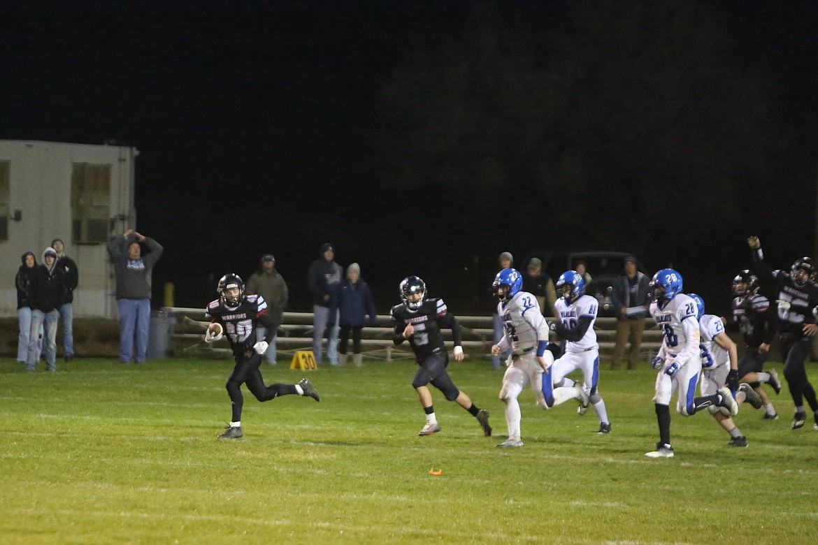 Freshman running back Harvest Parrish outruns kick coverage on an 80-yard kickoff return for a touchdown in the fourth quarter.