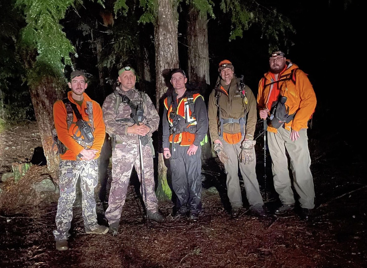 Members of David Thompson Search and Rescue gather after locating and helping an overdue hiker get back to the Cedar Creek Trail on Wednesday, Nov. 2. (Photo courtesy David Thompson SAR)