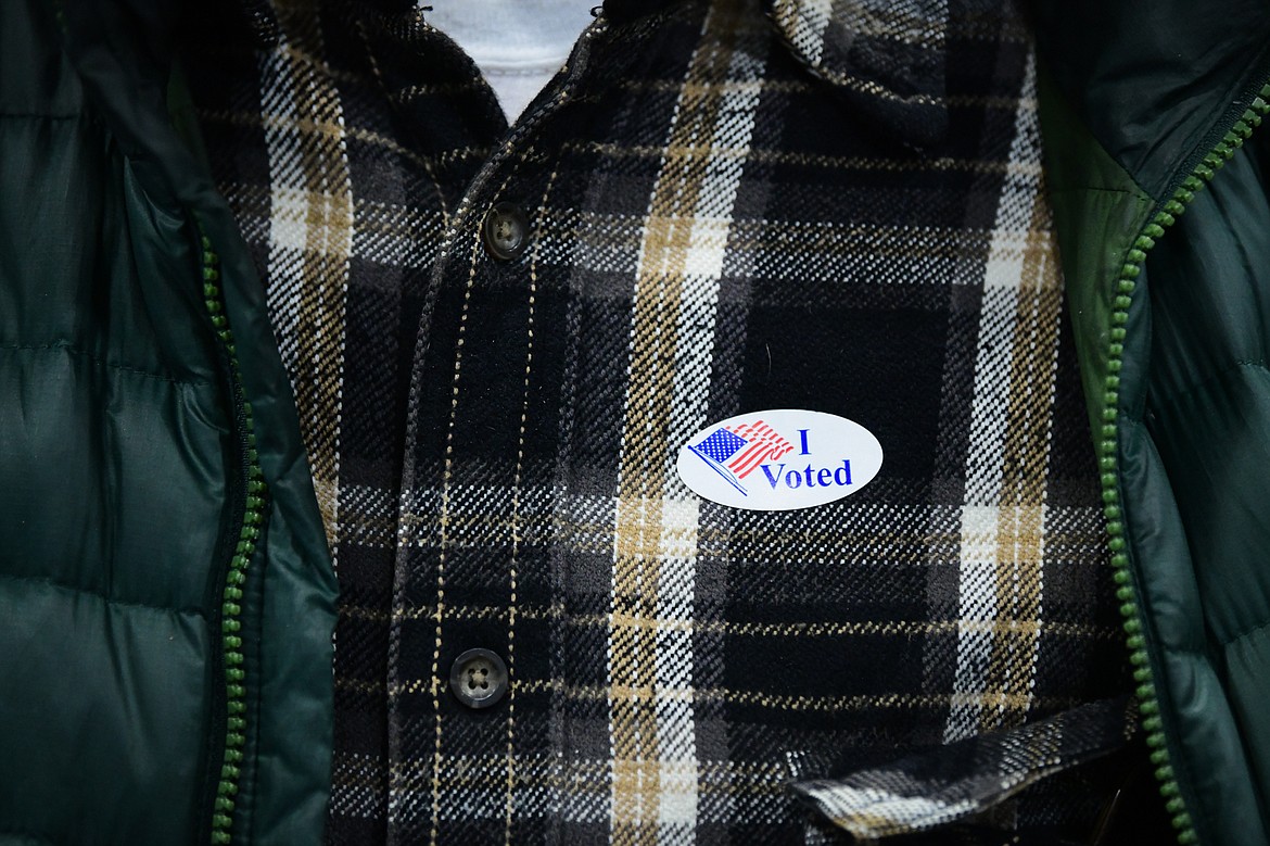 A voter with an "I Voted" sticker on his shirt after casting a ballot at the Trade Center at the Flathead County Fairgrounds on Tuesday, Nov. 8. (Casey Kreider/Daily Inter Lake)