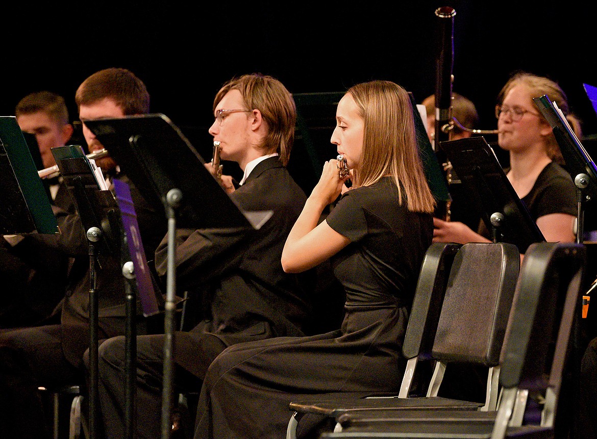 Whitefish High School Band students Mathew Rohrman and Addy Taylor perform during a special concert featuring professional trumpeter Allen Vizzutti at the Performing Arts Center in Whitefish on Thursday. (Whitney England/Whitefish Pilot)