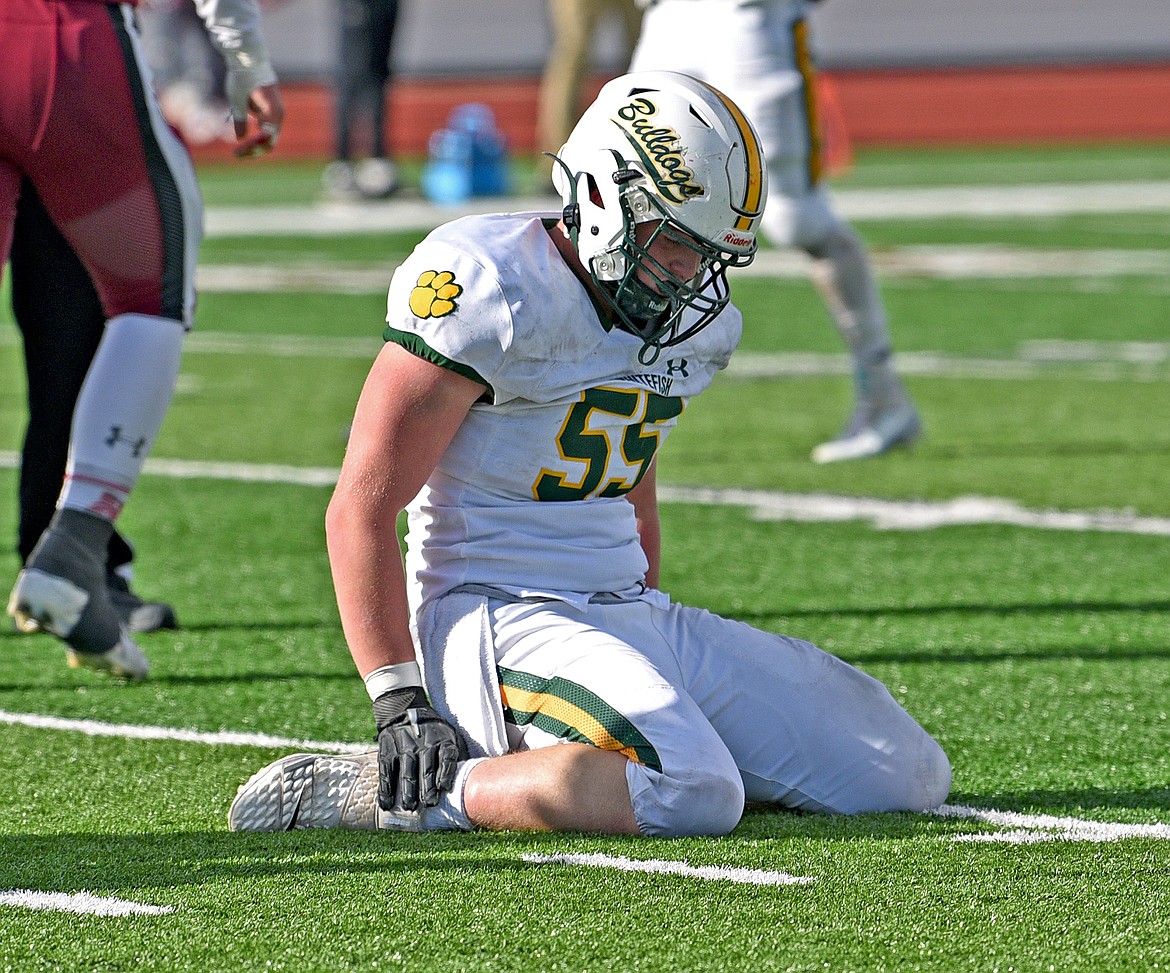 Bulldog senior lineman Kai Nash shows his frustration as Whitefish sees the game slip away in the State A quarterfinal against Hamilton on Saturday in Hamilton. (Whitney England/Whitefish Pilot)