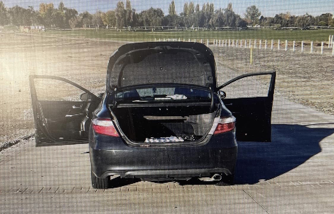 A Moses Lake woman was arrested Monday after an Adams County deputy pulled her over in the car pictured above. The vehicle was identified as stolen by onboard equipment inside the deputy's vehicle.