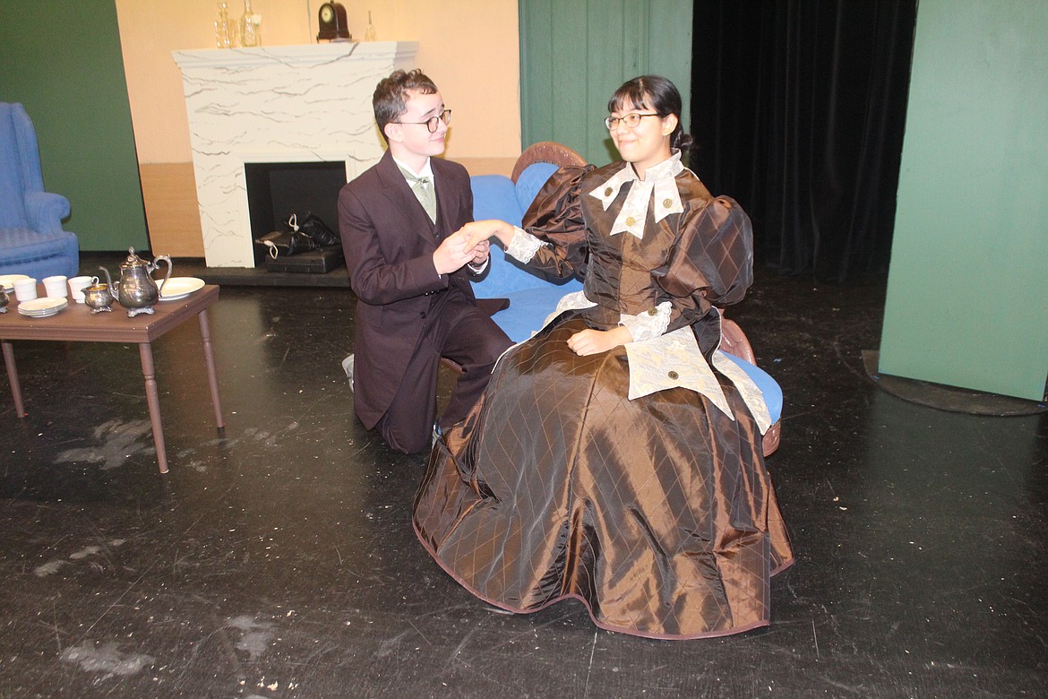 Jack (Sawyer Roylance, left) - or is Earnest? - proposes to Gwendolen (Genesis Castro, right). “The Importance of Being Earnest” will be performed this weekend by Othello High School drama students.