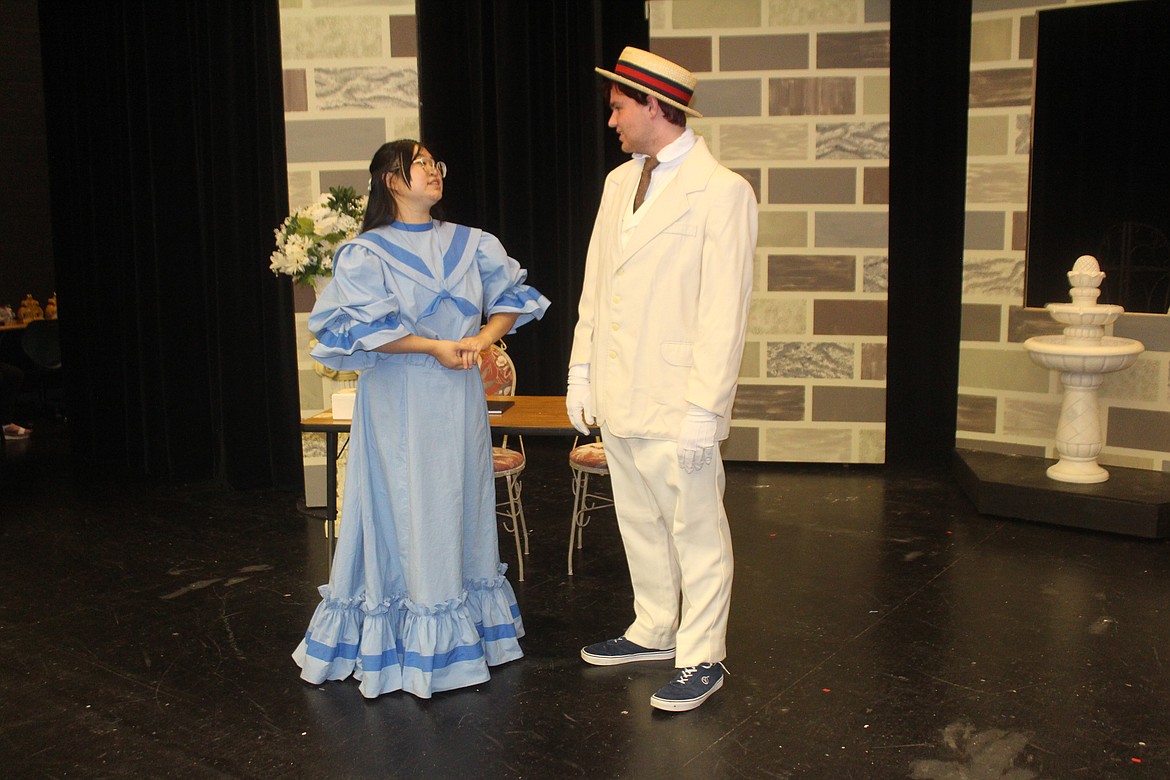 Cecily (Sophia Terayama, left) is taken with her wastrel Uncle Earnest (Liam Harvey, right) - who’s not really her uncle, or named Earnest. Othello High School drama students perform “The Importance of Being Earnest” this weekend.