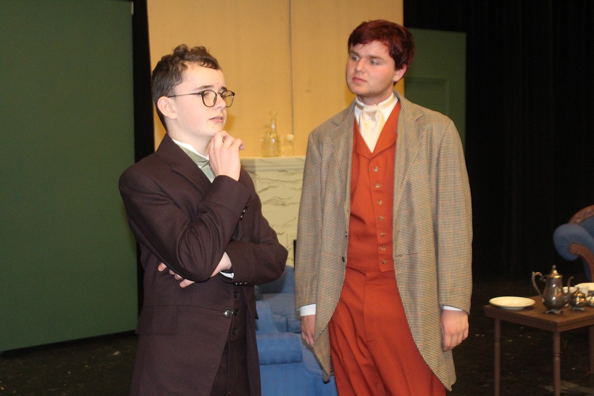 Jack (Sawyer Roylance, left) thinks he’s found a way out of his dilemma, which he tries out on his friend Algernon (Liam Harvey, right) in the Othello High School production of “The Importance of Being Earnest.”