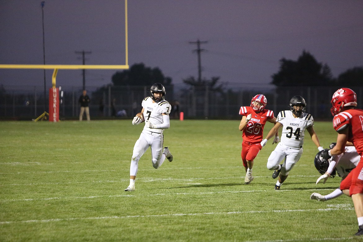 Royal senior Edgar De La Rosa (7) returns an intercepted pass against Othello on Sept. 9. The senior recently was moved from safety to outside linebacker, where he can use his physicality to his advantage.