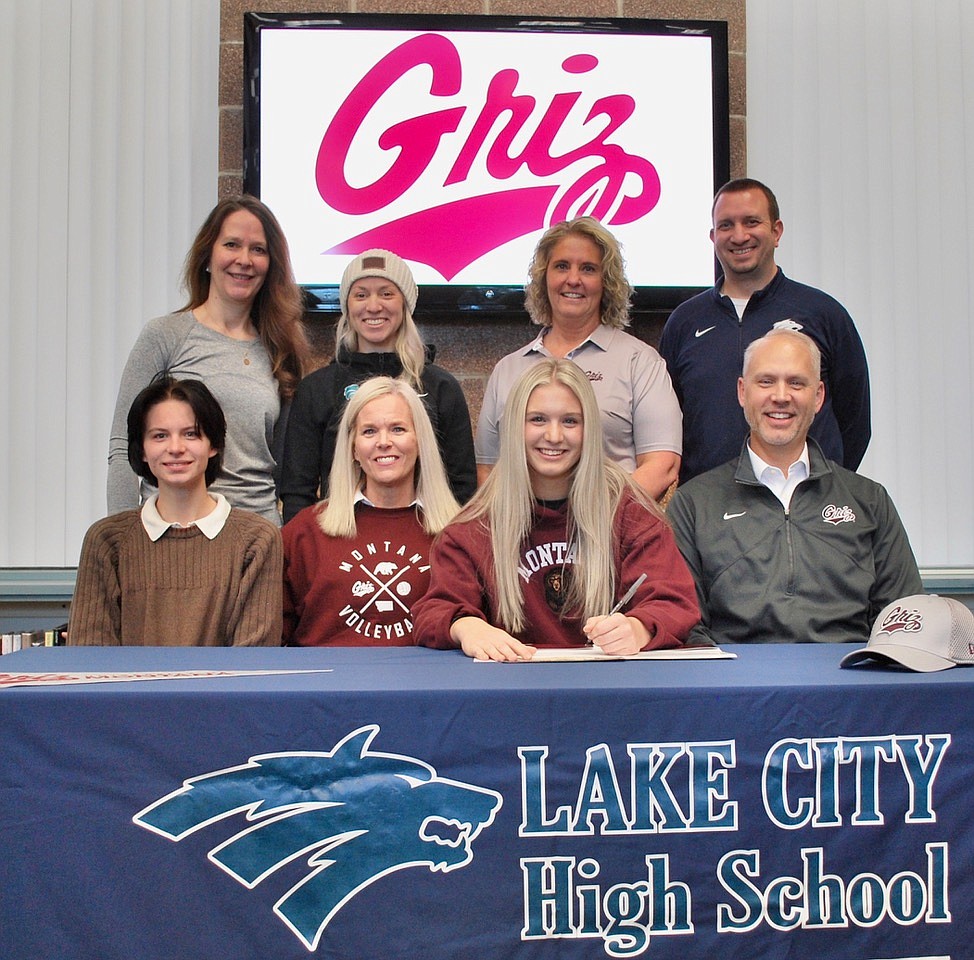Courtesy photo
Lake City High senior Olivia Liermann recently signed a letter of intent to play basketball at Montana. Seated from left are Sophia Liermann (sister), Jodi Liermann (mom), Olivia Liermann and Christopher Liermann (dad); and standing from left, Nicole Rayborn, club volleyball coach; Michelle Kleinberg, Lake City volleyball coach; Barb Patton, club volleyball coach; and Troy Anderson, Lake City athletic director.