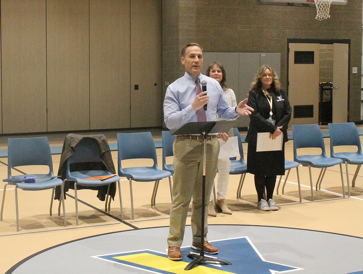 Moses Lake School District Superintendent Monty Sabin welcomes parents, students and community members to the Vanguard Academy ribbon cutting Wednesday.