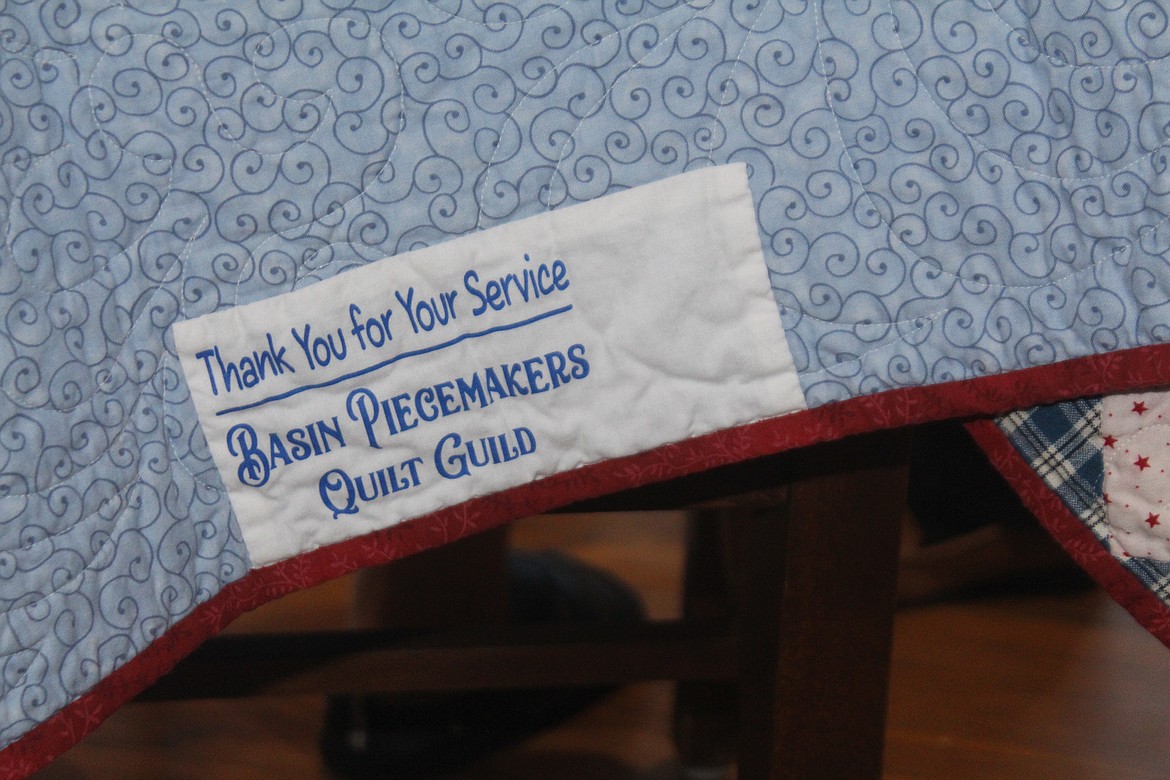Each quilt donated to veterans by the Basin Piecemakers Guild carries a message of appreciation.
