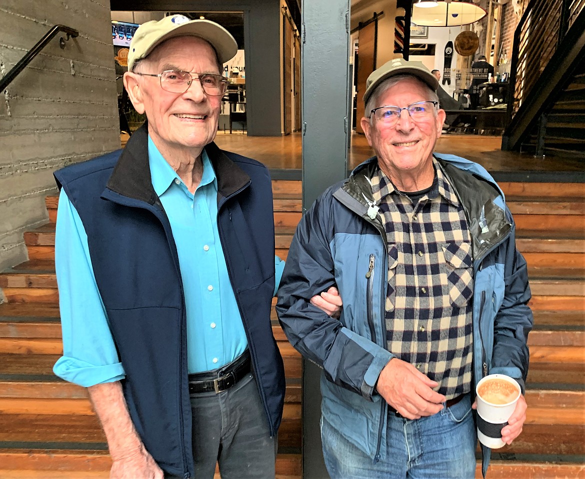 Ray Johnson, left, and Sandy Emerson leave Coeur d'Alene Coffee Company following their Tuesday morning hour of coffee and conversation.