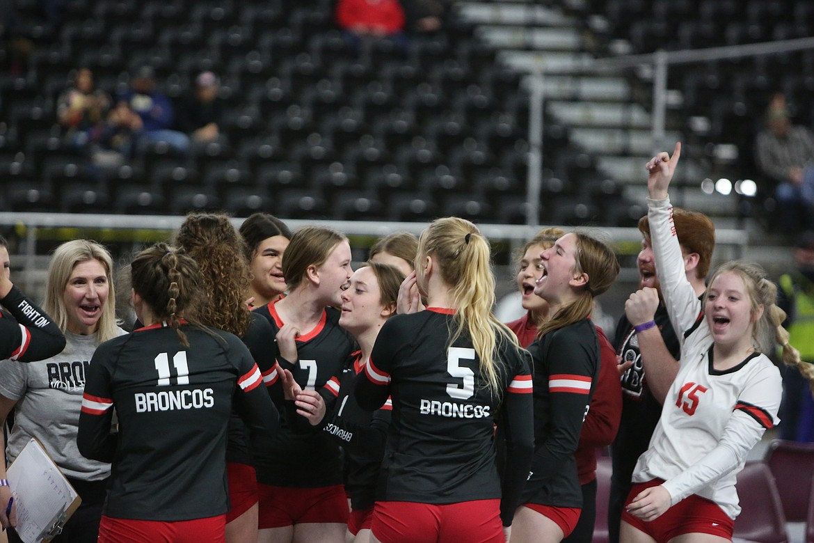 The Lind-Ritzville Broncos celebrate after upsetting No. 6 seed Goldendale, advancing to the second round of the 2B State Tournament.