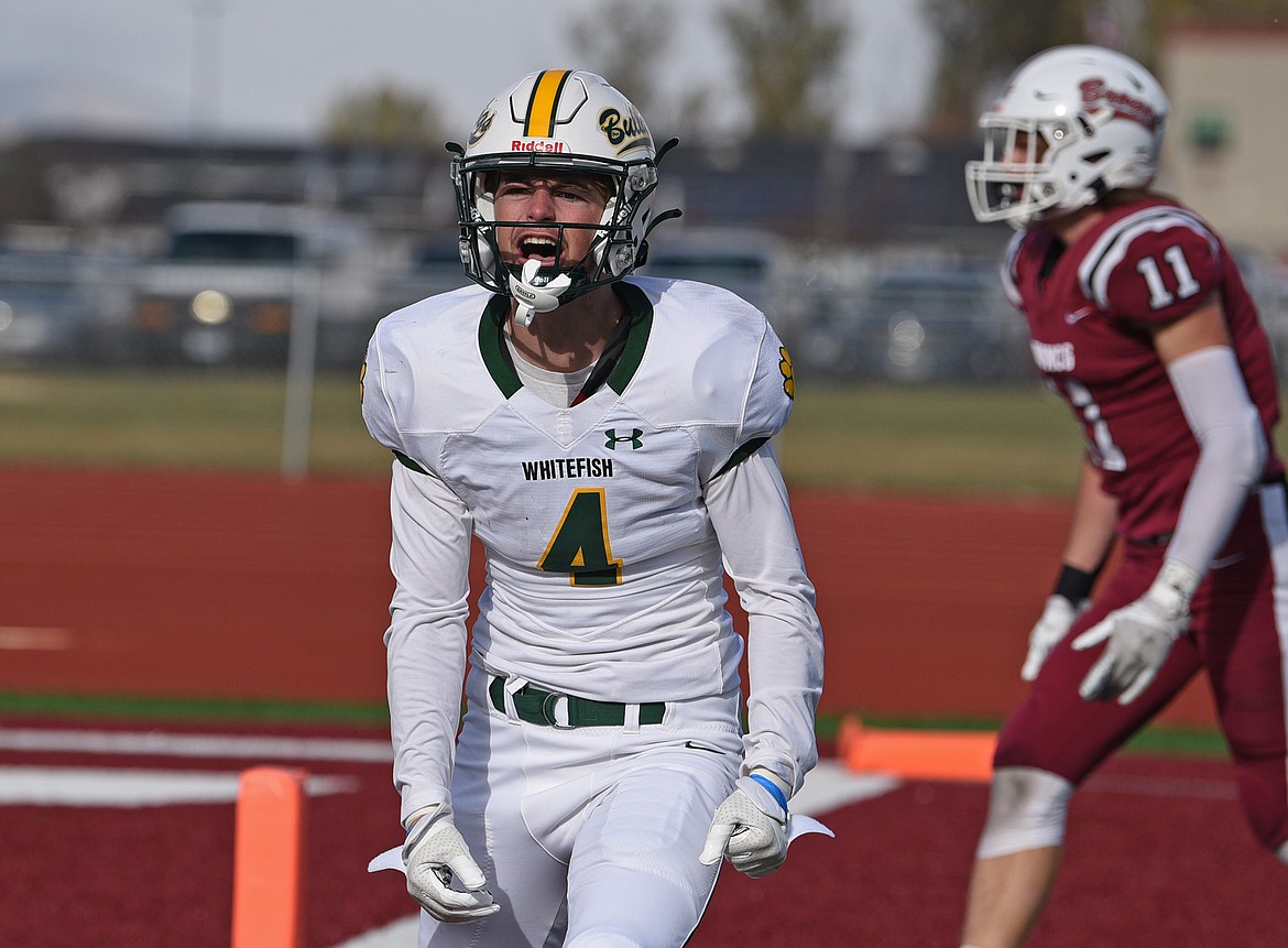 Whitefish's Dane Hunt celebrates after making a big catch in the red zone during a quarterfinal playoff game against Hamilton Saturday. (Whitney England/Whitefish Pilot)