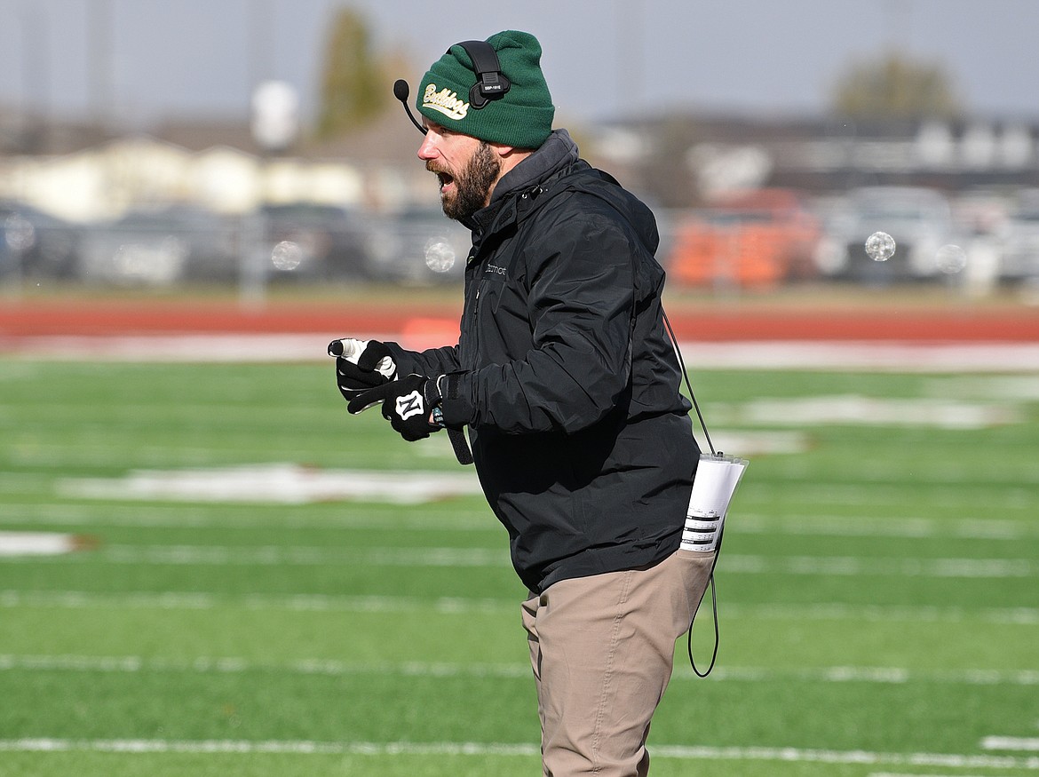 Whitefish head coach Brett Bollweg yells out a play call during a quarterfinal playoff game against Hamilton Saturday. (Whitney England/Whitefish Pilot)