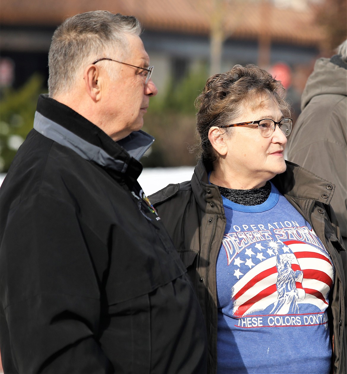 Jim and Linda Straub of Dalton Gardens listen during the Veterans Day ceremony at McEuen Park's Veterans Memorial on Friday.