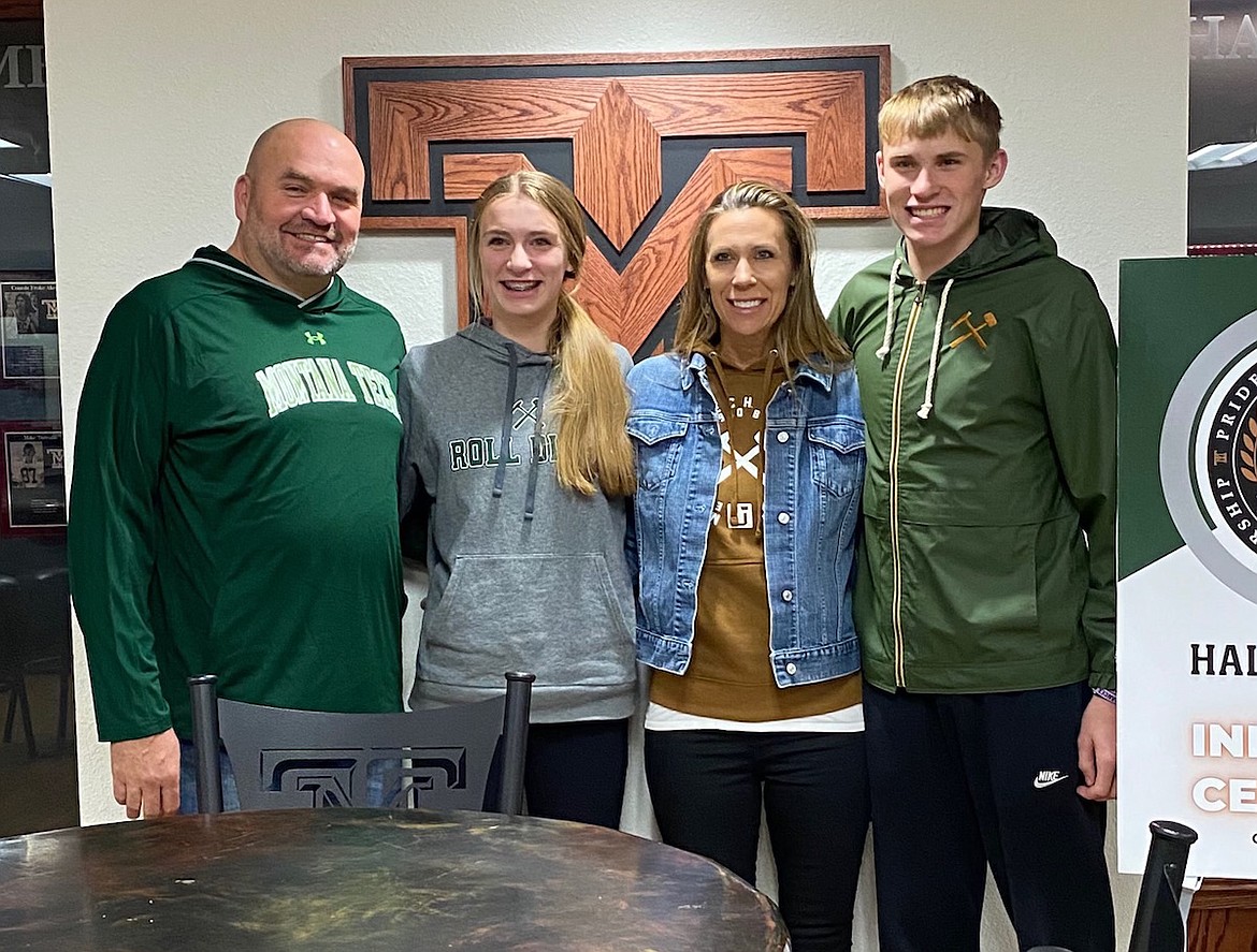 Lori (Stamy) Quinn celebrates her induction into the Montana Tech Hall of Fame with her husband Mark, and two children, Eli and Mason. (Courtesy photo)