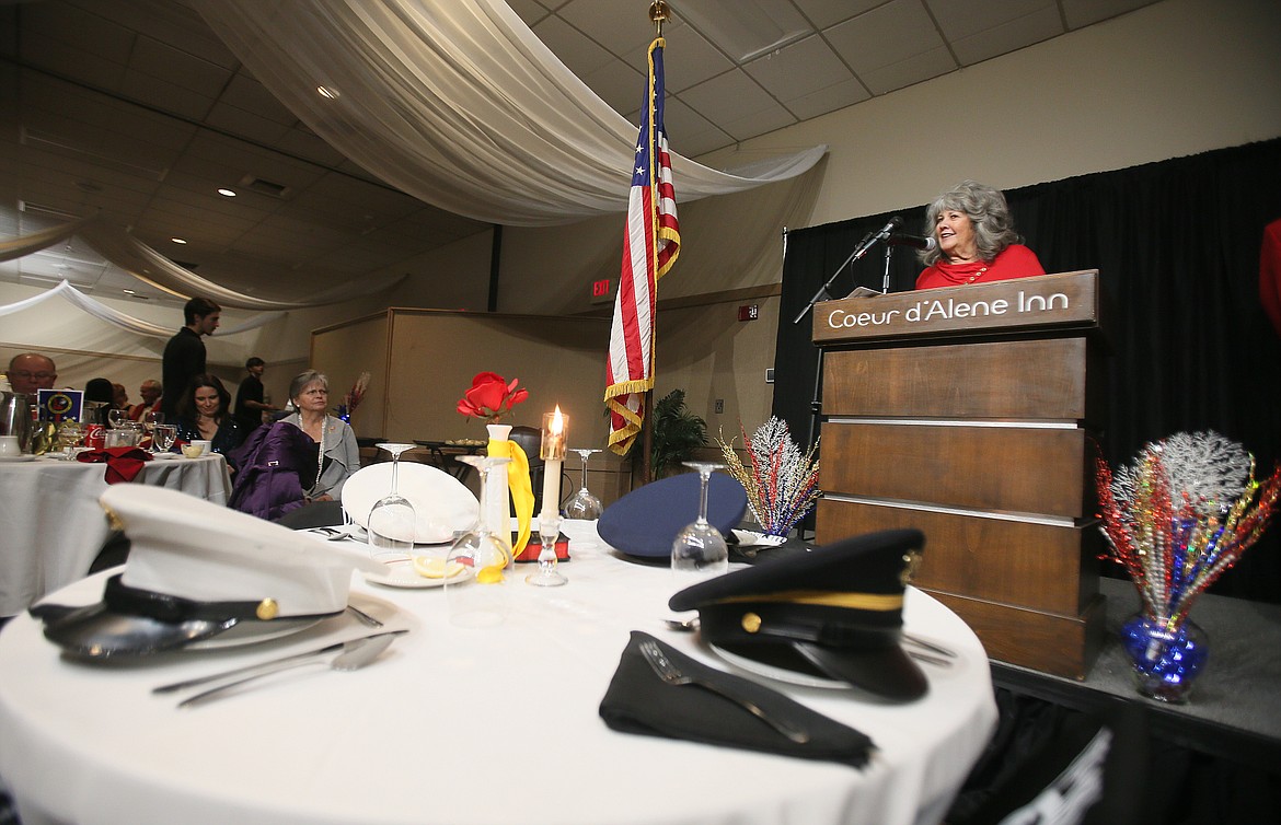 Guest speaker Kerri Thoreson, daughter of the late Ron Rankin, a dedicated Marine, shares stories of her father Friday night during the Marine Corps Birthday Ball. The POW/MIA Table, set in honor of prisoners of war and service men and women missing in action, can be see in the foreground