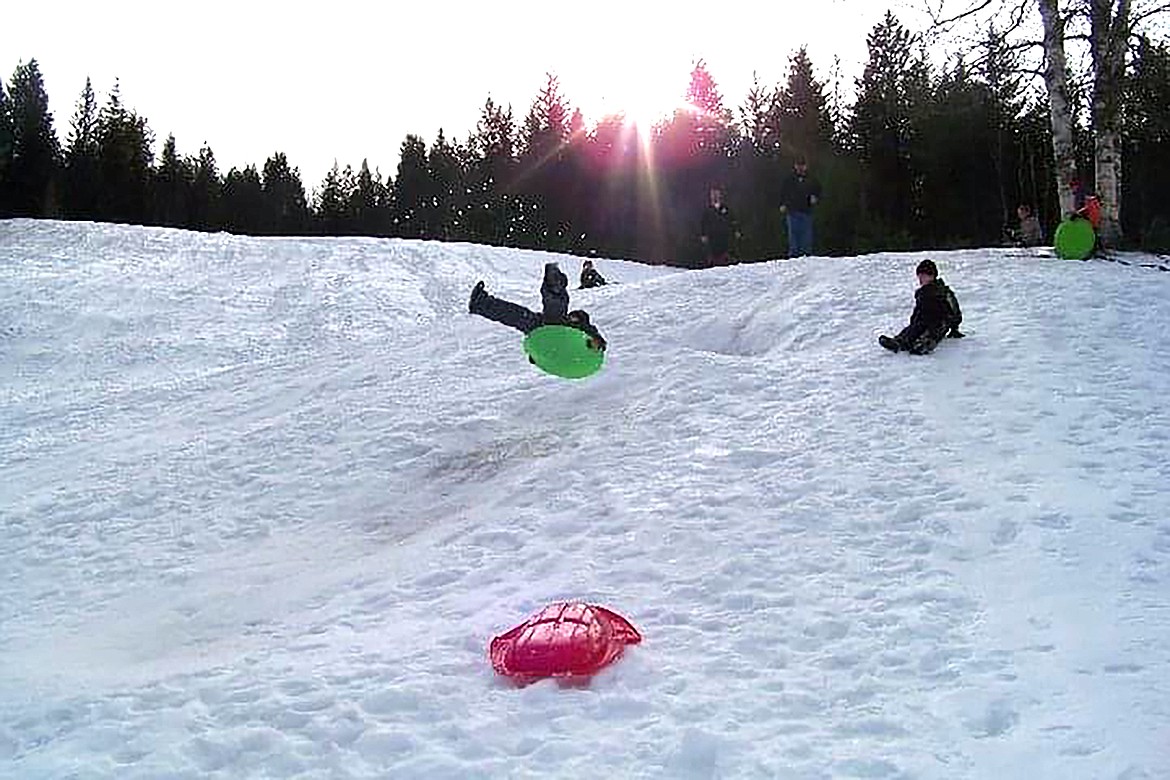 Kids sledding at Pine Street Sled Hill in the winter of 2011.