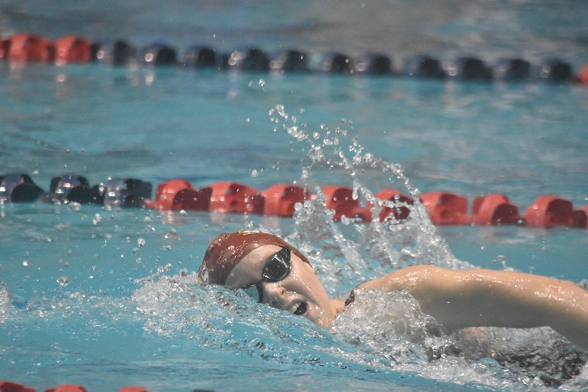 Makhaela Parrish swims at the state swim preliminary competition for her chance to race Saturday in the finals.