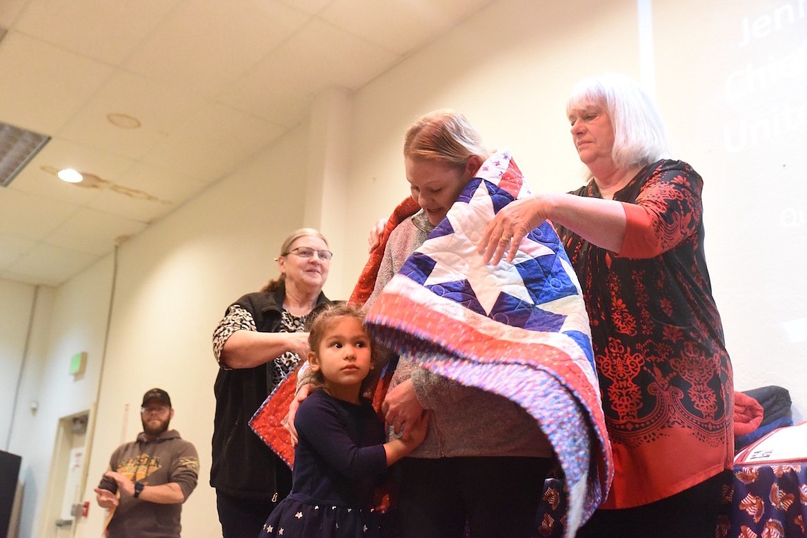 Jennie Holthaus, who served her country in the U.S. Navy, enjoyed receiving a Quilt of Valor from the Kootenai Valley Quilt Guild on Friday, Nov. 11, at the VFW Harper Erdman Post 1548. (Scott Shindledecker/The Western News)