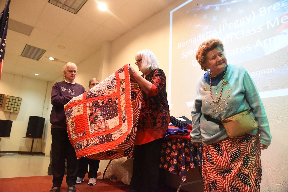 Peggy Breeden, who served her country in the U.S. Army, enjoyed receiving her Quilt of Valor from the Kootenai Valley Quilt Guild on Friday, Nov. 11, at the VFW Harper Erdman Post 1548. (Scott Shindledecker/The Western News)