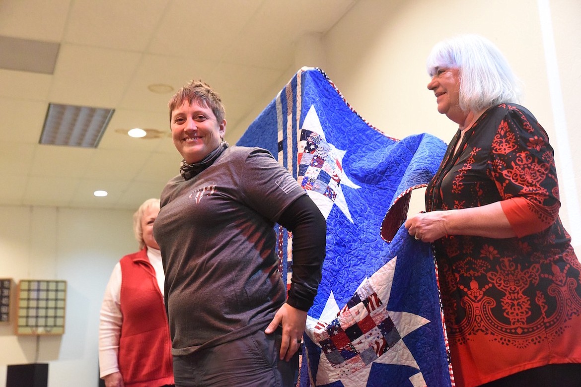 Tina Resch, who served her country in the U.S. Army, truly enjoyed receiving her Quilt of Valor from the Kootenai Valley Quilt Guild on Friday, Nov. 11, at the VFW Harper Erdman Post 1548. (Scott Shindledecker/The Western News)