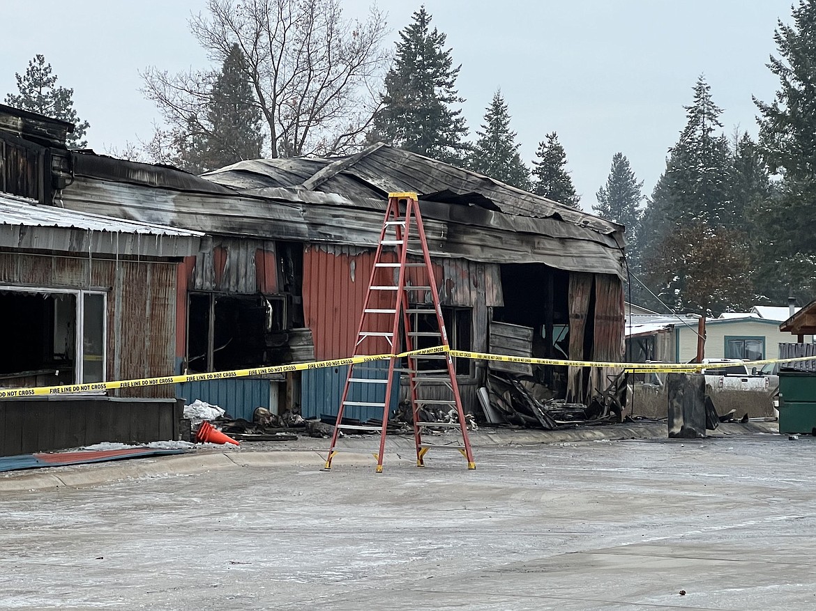 The Shed Restaurant and Bar, located a few miles east of Libby, was heavily damaged by an early-morning fire on Monday. Libby Volunteer Fire Chief Steve Lauer said the call came in at 1:04 a.m. and 18 firefighters were on scene for about 5 1/2 hours. No one was injured. Libby Ambulance was on stand by while Flathead Electric and the Lincoln County Sheriff's Office also responded. Lauer said the cause of the fire was under investigation. (Suzanne Resch/The Western News)