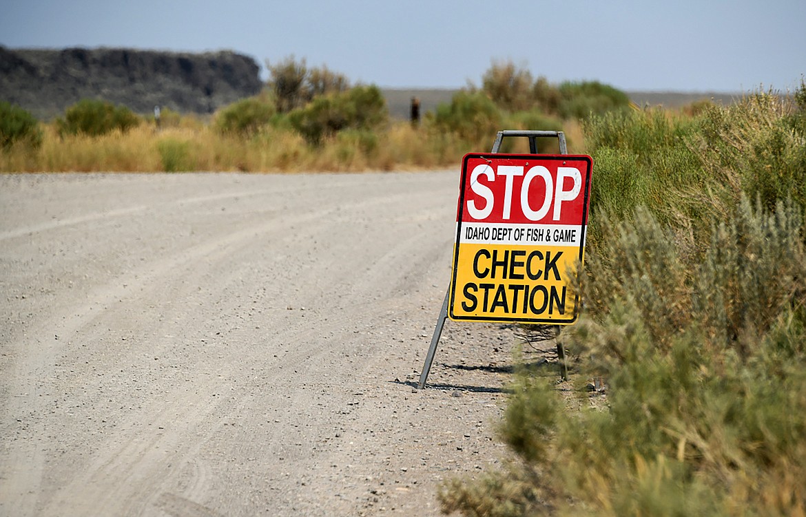 Enforcement check station signage indicates a hunter check station location where Idaho Fish and Game staff are collecting lymph node samples from deer. Samples will again be collected this coming weekend.