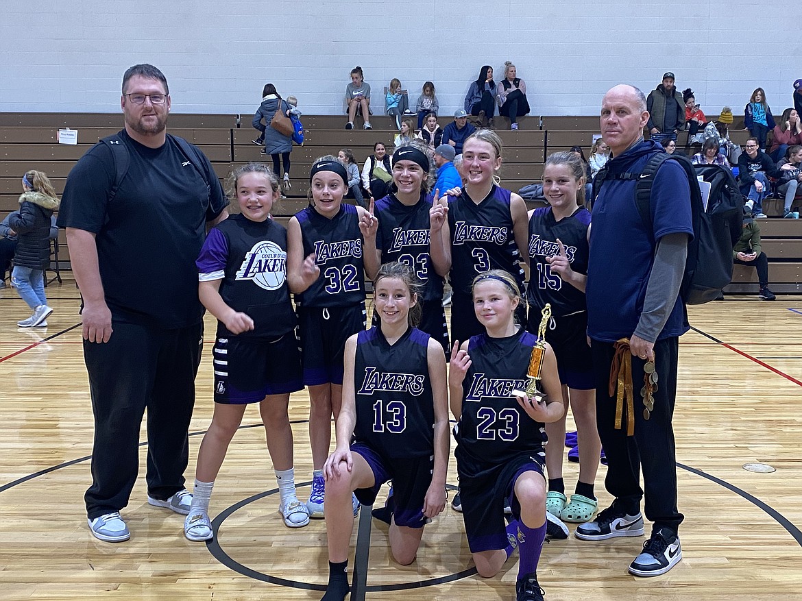 Courtesy photo
The sixth grade Coeur d'Alene Lakers girls basketball team went 5-0 to win the River City Basketball Tournament. In the front from left are Noelia Axton and Brynlee Johnston; and back row from left, coach Corey Brown, Emmerson Cummings, Gretah Angle, Allie Jenkin, Payton Brown, Savannah Stevens and coach Royce Johnston.