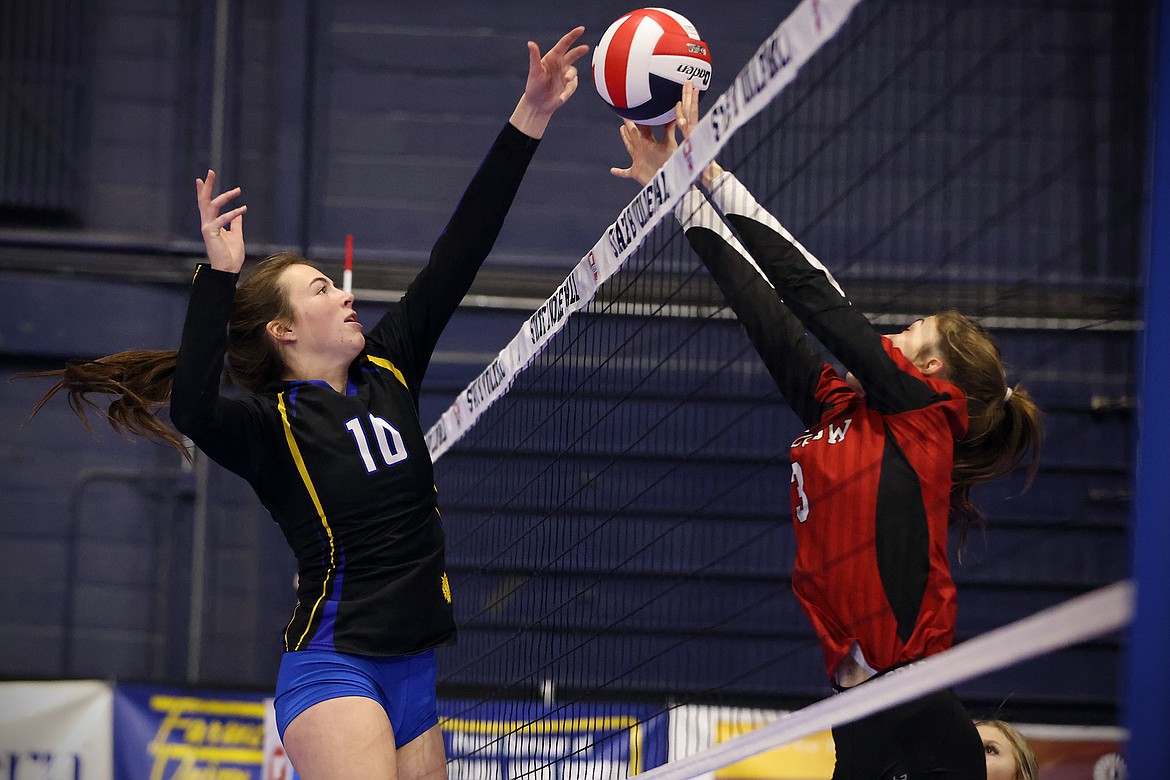 Ellie Baxter makes a play at the net as Thompson Falls battled Glasgow at the All-Class State Volleyball Tournament in Bozeman Friday, Nov. 11. (Jeremy Weber/Daily Inter Lake)