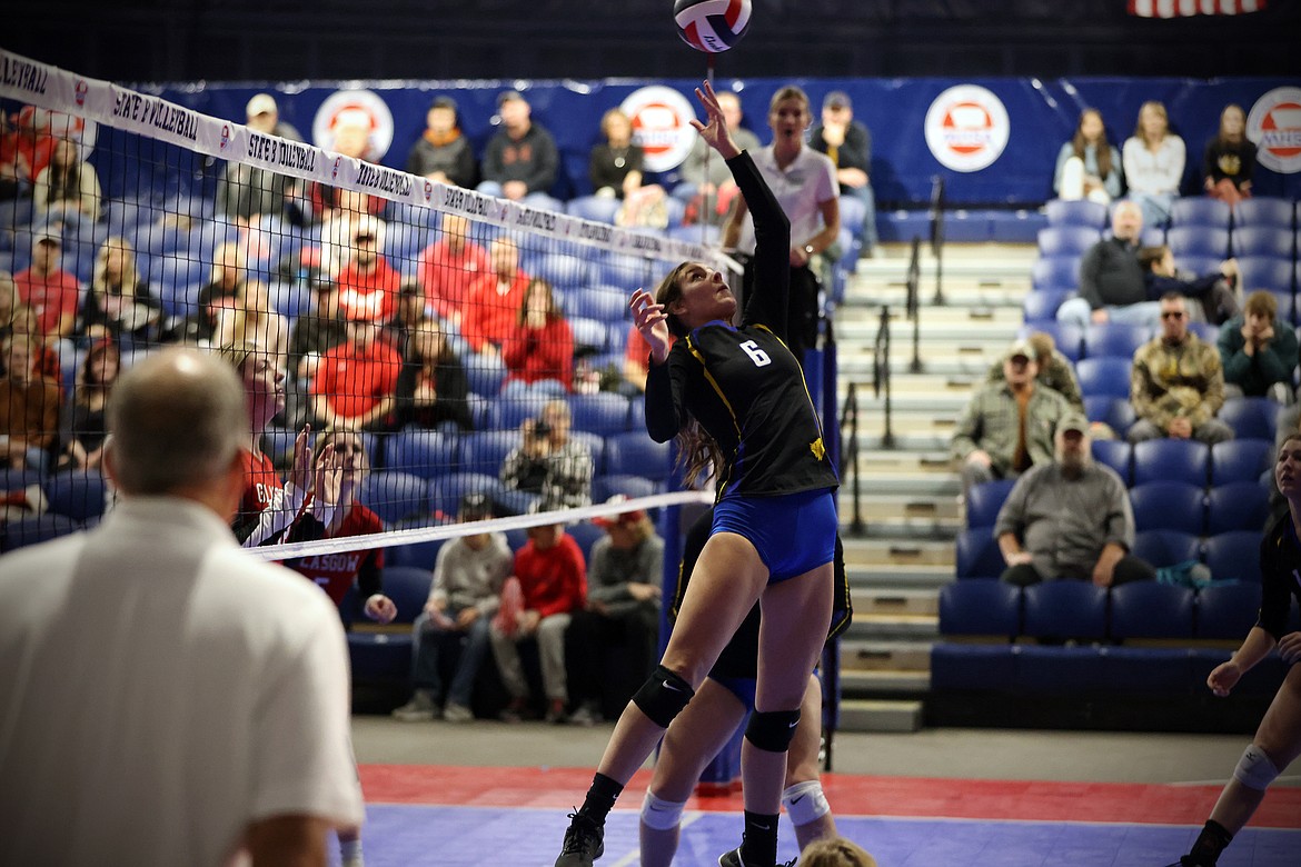 Avery Burgess makes a tough play for the Lady Blue Hawks as Thompson Falls battled Glasgow at the All-Class State Volleyball Tournament in Bozeman Friday, Nov. 11. (Jeremy Weber/Daily Inter Lake)